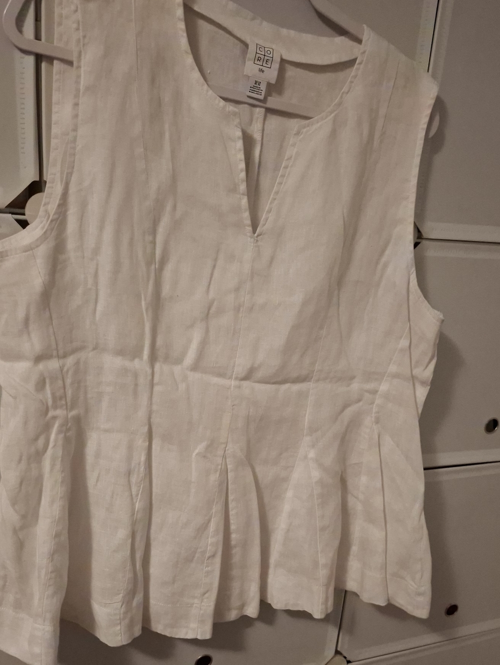 Core White Sleeveless Linen Peplum Tunic